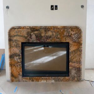 breche vendome gold marble fireplace